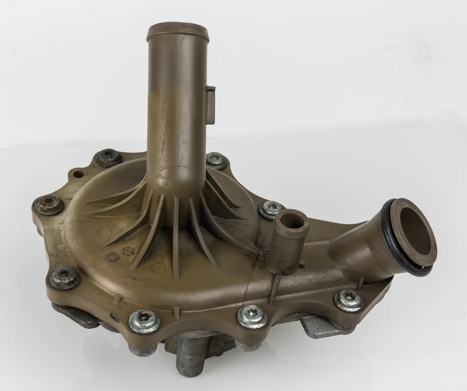Removed automotive mechanical coolant water pump and hose connections